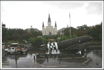Post Reunion: C-47 Being Moved Through New Orleans Into D-Day Museum