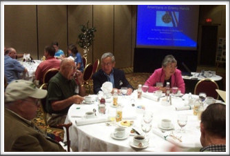 Business Meeting: “Brad” Bradford, Ed Graf, Jimmie & Lynn Kanaya awaiting Kanaya Presentation