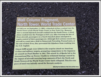 Sign displayed next to a 5-ton piece of steel from one of the twin towers 